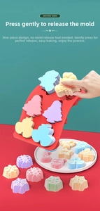 Detail showing easy release of Christmas silicone mold for tree and snowflake shapes