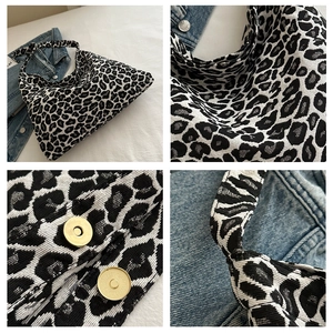 Detail shots of leopard print tote bag with magnetic clasp and knotted strap texture