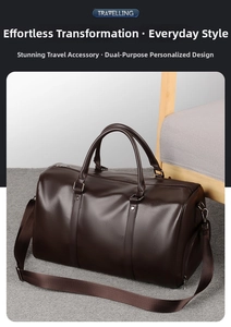 Close-up of a dark brown pebble grain leather travel bag with metal hardware and strap