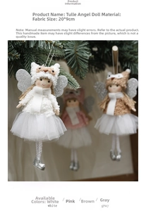 Detail of handcrafted gauze angel doll hanging on a Christmas tree with glitter wings