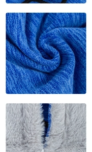 Detailed macro view of royal blue fleece fabric and thick grey plush thermal lining