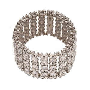 Elastic wide silver bracelet with rows of sparkling crystals in a teardrop geometry design