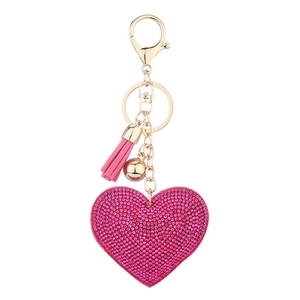 Pink rhinestone heart keychain with gold clasp and matching tassel on white background