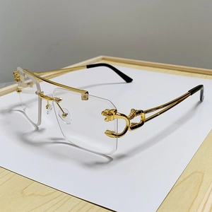 Frameless double bridge gold sunglasses with leopard head accent on 45-degree angle