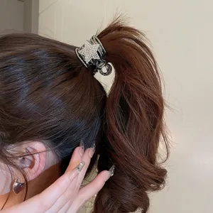 Sparkling Y2K star hair claw clip with rhinestones for high ponytail styling