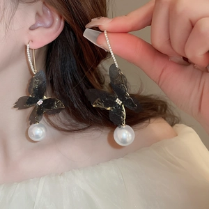 Elegant long lace butterfly earrings with white faux pearls and gold finish for women