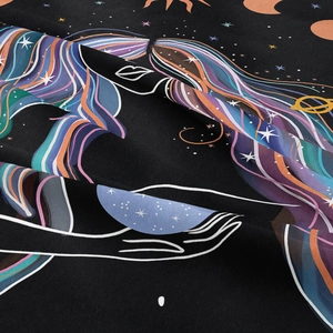 Detail shot showing the high-quality fabric texture and abstract celestial print of the tapestry