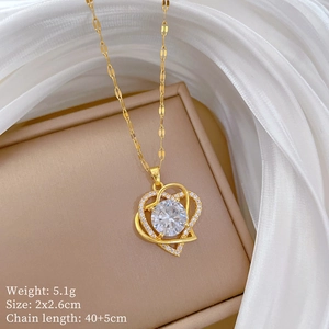 Detailed view of heart pendant necklace with dimensions and weight specs on card