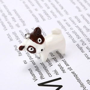 Handmade resin puppy charm with brown patches and metal ring for DIY jewelry making