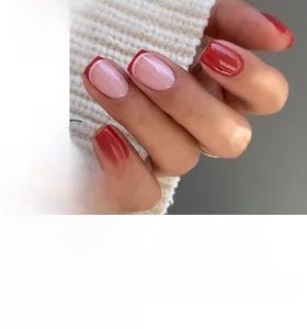 Short square press-on nails featuring glossy deep red and pink French tip design