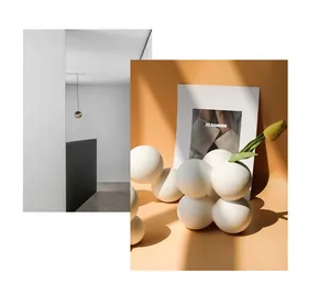Detailed view of matte white spherical ceramic vase with modern geometric stacked spheres