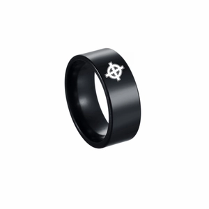 Detail of 8mm black stainless steel ring featuring white Celtic knot laser engraving