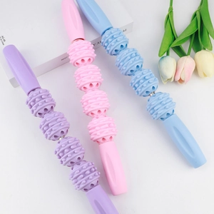 Rouleaux de massage musculaire manuel aux couleurs pastel pour relaxation jambes et dos
