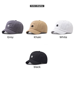 Short brim baseball caps with embroidered M logo shown in grey, khaki, white, and black colors