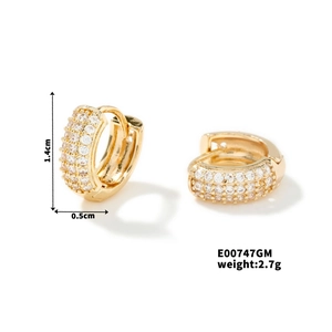 Detail view of gold C-shaped earrings with cubic zirconia and exact product dimensions