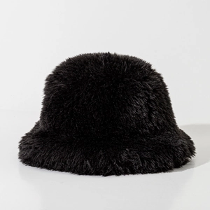 Detailed texture of thick black faux fur on a warm winter bucket hat for women and men