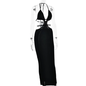 Detail of black knit halter maxi dress with intricate waist and chest cut-out design