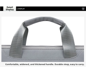 Detail of reinforced wide thickened nylon handle on grey fabric laptop sleeve case