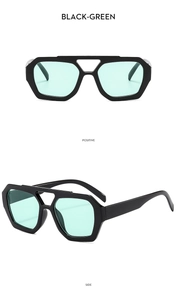 Black geometric aviator sunglasses with green lenses showing front and side views
