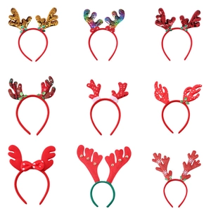 Assorted Christmas reindeer antler headbands in festive red and green with sequins