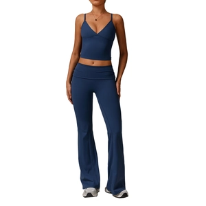 Women's dark blue two-piece yoga set with V-neck camisole and flared high-waisted leggings