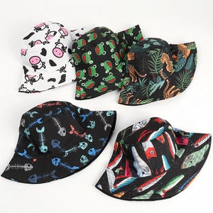 Set of 5 reversible bucket hats featuring animal prints like cow, leopard, and fish patterns