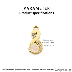 Macro view of 18K gold infinity pendant with inlaid crystals and daisy flower detail