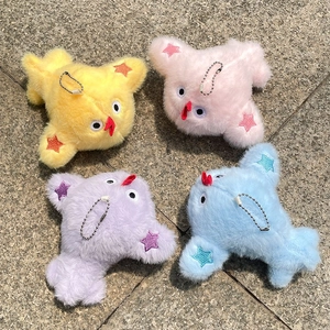 Detailed view of colorful plush animal charms with star embroidery and metal bead chains