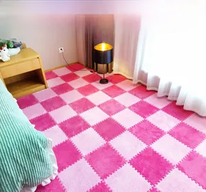 Detail of pink and fuchsia plush puzzle floor tiles with interlocking foam edges
