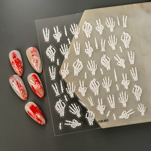 5D Halloween nail stickers featuring white embossed skeleton hands and red blood splatters