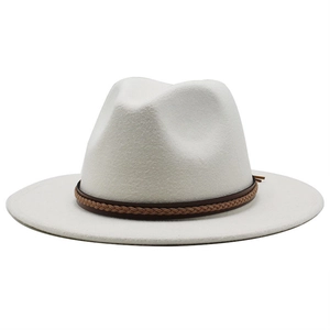 Detail of white wool fedora hat featuring a stylish brown braided leather headband