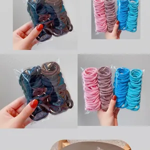 Detail of high-elasticity seamless hair ties in candy colors pack with storage bag