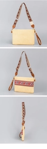 Detail view of woven straw envelope crossbody bag with patterned bohemian strap