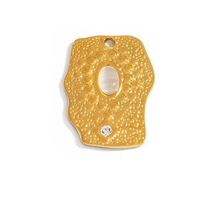 Detail of golden stainless steel sun flower pendant with hammered texture and white zircon