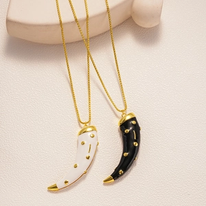 Retro horn pendant necklace with gold studs on beige stone, black and white set