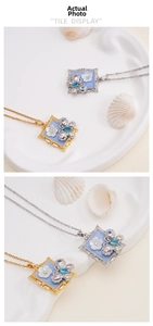 Detail of square oil painting necklace with crystal butterfly and white flower charms