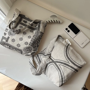 Retro linen shoulder bag with mandala floral and geometric prints in a minimalist style