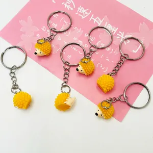 Set of creative yellow hedgehog keychains made of soft resin for bag accessories