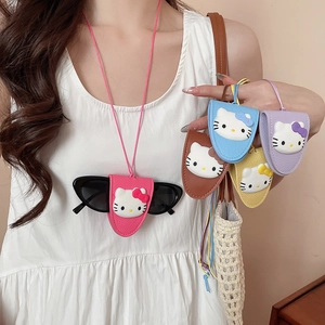 Close-up of Hello Kitty faux leather glasses case with neck strap in multiple colors