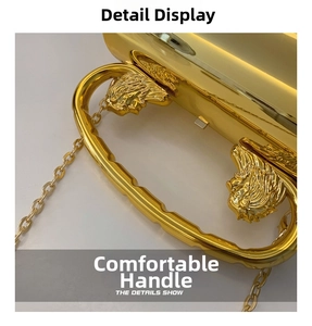 Detail showing high-polish gold evening bag with ornate lion head handle and chain strap