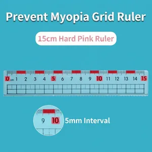 Detailed view of a 15cm pink rigid ruler featuring 5mm scale grids for precise writing