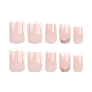 French manicure set with nude base, white tips, and golden glitter accents on short nails