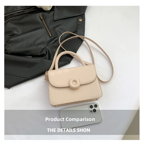 Beige mini square handbag with gold lock and thin strap shown next to a smartphone