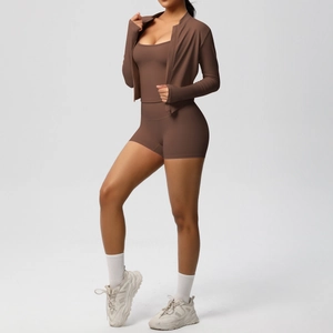 Detailed view of coffee brown three-piece yoga set with thumb holes and high waist shorts