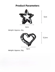 Detailed view of 6cm black glossy star and heart hair claws with specific size measurements