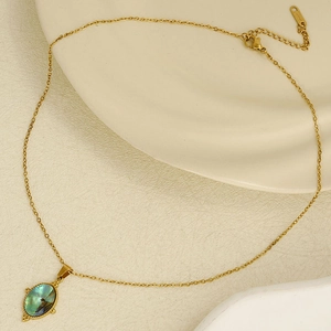 Elegant gold stainless steel necklace with an oval green-blue abalone shell pendant design