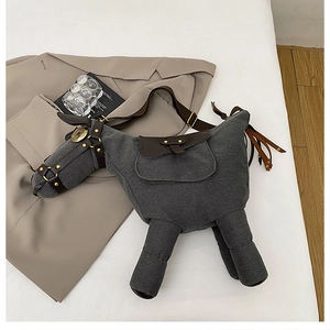 Unique horse-shaped grey canvas crossbody bag with brown leather accents and gold hardware