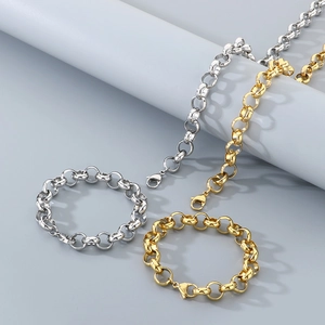 Detailed display of gold and silver titanium steel link necklaces and bracelets