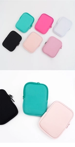 Detailed view of multi-color neoprene zipper pouches for 40OZ tumblers and small items