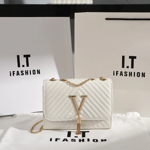 White quilted shoulder bag with gold V logo, tassel detail and metal chain strap